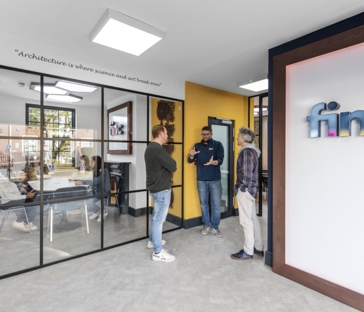 FINC Architects team collaborating in the studio